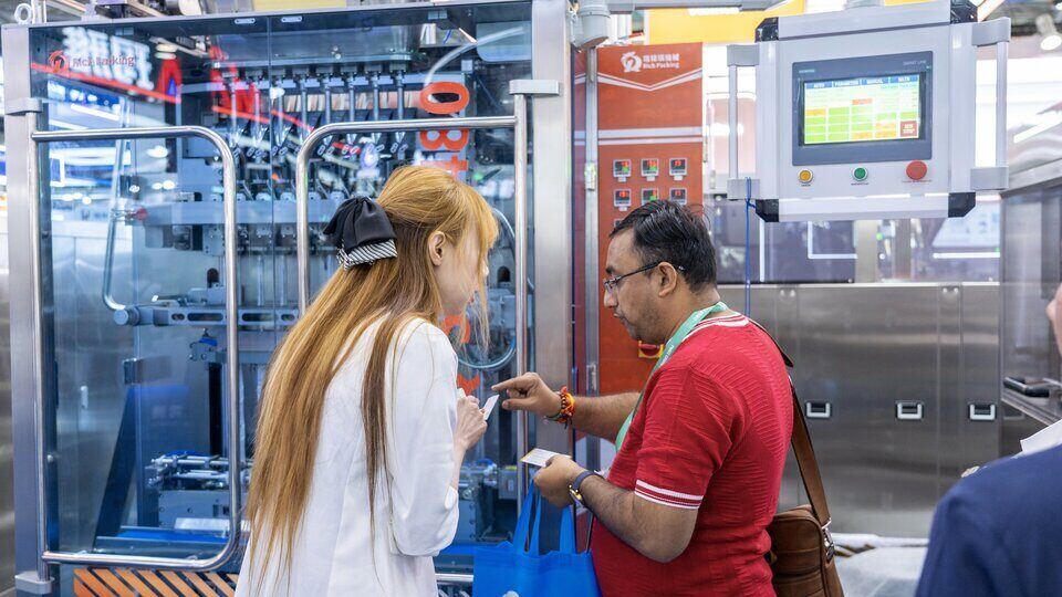 Compliance and precision of the Stick Packing Machine were discussed with the visitor