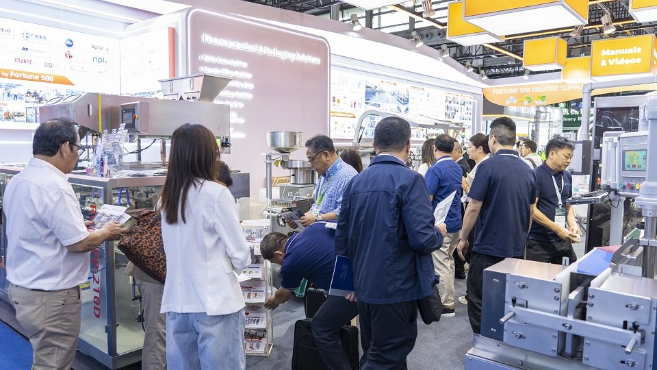 Visitors learning about Rich Packing&rsquo;s products