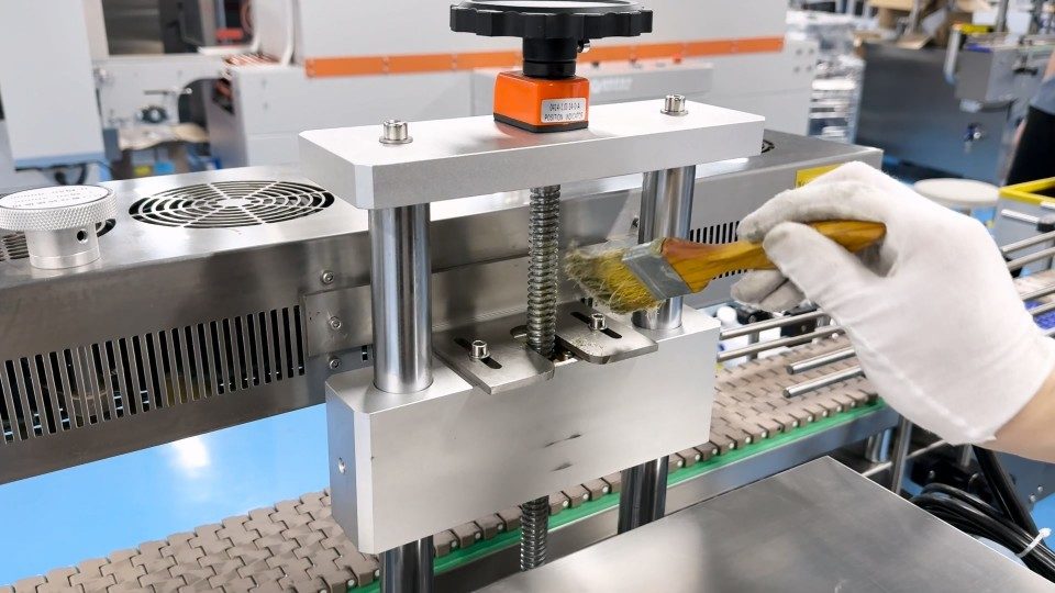 Induction sealing machine maintenance for pharmaceutical packaging lines
